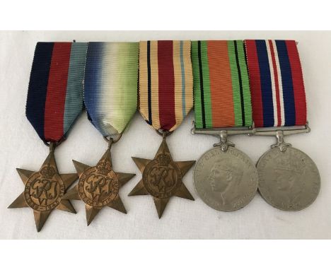 A WWII 5 medal group re Walter Brian Redditt serving in the Royal Navy. Comprising; 1939-45 Star, Atlantic Star, Africa Star,