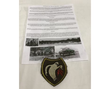 An American WWII "Ghost Army" patch. A member of the unit who 'made' false units to deceive the enemy prior to D-Day. 