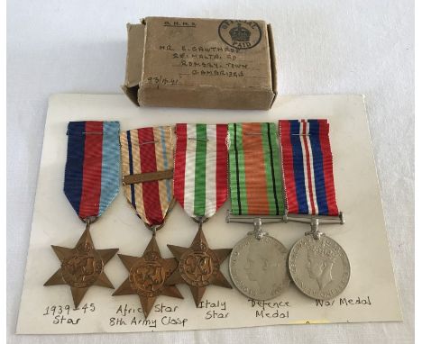 WW2 Medal Group to include Africa Star with 8th Army clasp. 5 medals with medal box and awards granted leaflet. Box named to 