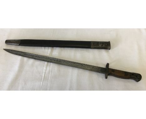 c.WW1 British bayonet and sheath. Wilkinson blade, dated 1907. Total length in sheath approx 57cm long.
