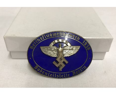 A German WWII NSFK enamel 1938 badge.  