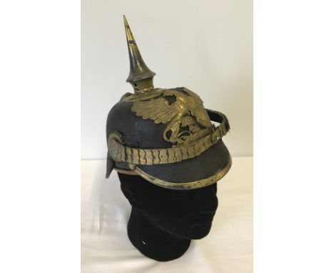 An Officers WWI leather Pickelhaube, Baden plate. Service wear. 
