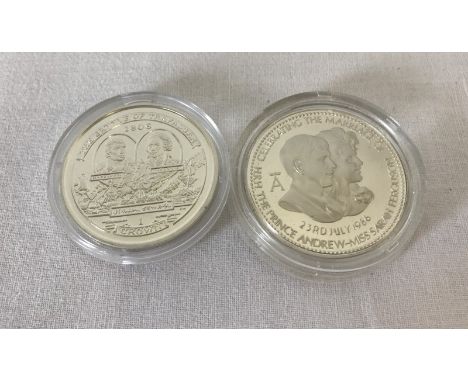 Two silver proof crowns. First is Isle of man 2005 crown to commemorate the Battle of Trafalgar. Second to celebrate the marr
