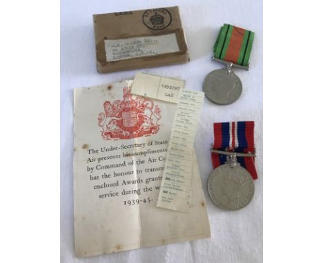 WW2 pair medals. 1939-45 War and Defence medals with medal box and awards granted leaflet. Box named to G.S. Coombe. 