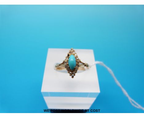 An 18ct gold ring set with a turquoise surrounded by diamonds, size K (2.2g) 