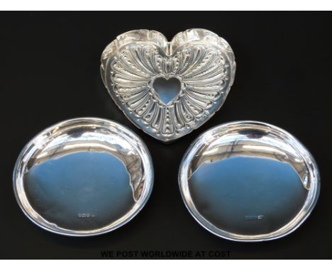 A Victorian hallmarked silver heart shaped trinket tray, length 10cm, London 1892 together with a pair of pin trays,  diamete