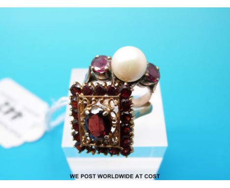 A 9ct gold ring set with garnets in a rectangle and a yellow metal ring set with a large pearl flanked by garnets, size Q/R &