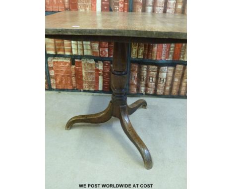 An oak occasional table with tripod base (W79cm x H71cm) 