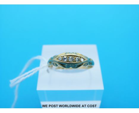 An 18ct gold ring set with diamonds (Size R)