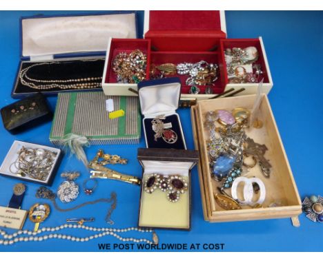 A collection of costume jewellery including hallmarked silver Celtic cross, brooches, hallmarked silver pendant, silver ring,