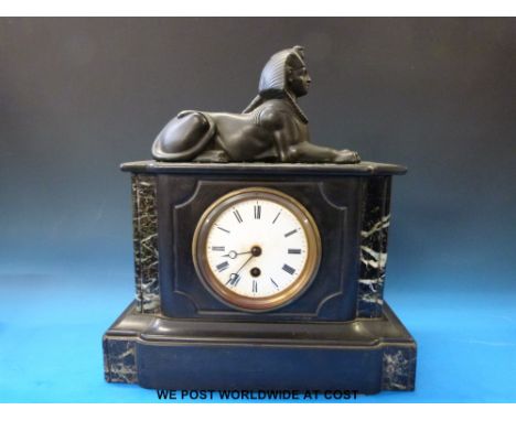 A Victorian black slate mantel clock with sphinx surmount and a dial barometer