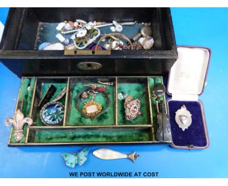 A quantity of jewellery to include a hallmarked butterfly brooch set with enamel by JA&S, silver fob, silver brooches, mother