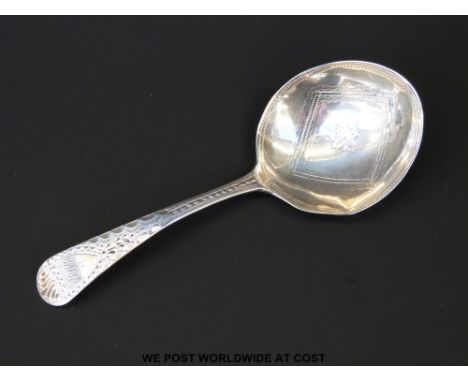 A hallmarked silver George III caddy spoon with bright cut decoration, London 1802, maker George Wintle (length 10cm)