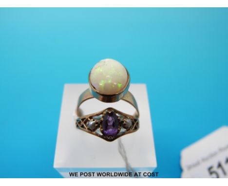 A 9ct gold ring set with an opal and a yellow metal ring set with an amethyst, size N and L/M (4.3g) 