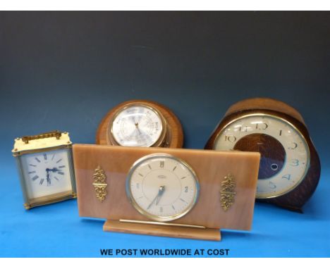 Three clocks and an aneroid bulkhead barometer by 'Weathermaster' including Smiths and Tempora