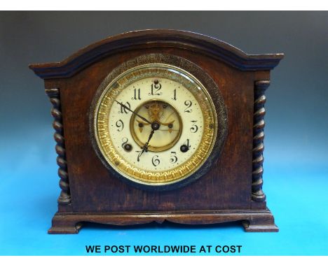 Ansonia visible escapement two-train mantel clock with beetle and poker hands, gilt bezel and barley twist decoration to case