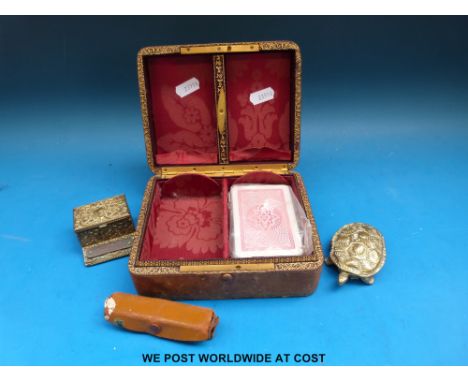 A wrythen moulded and leather playing card box by Houghton & Gunn, 162 Bond Street with gilt decoration and fitted interior t