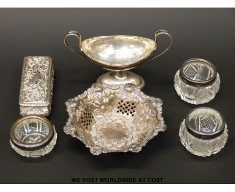 A hallmarked silver pierced bowl, diameter 12cm and a hallmarked silver dressing table pot (weight 84g) together with three h