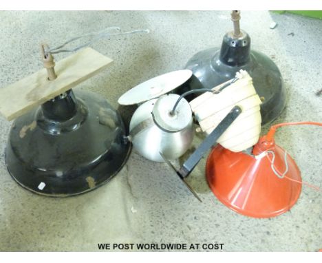 A quantity of industrial light fittings 