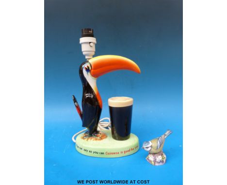 A Carlton Ware Guiness toucan lamp and Royal Worcester bird.