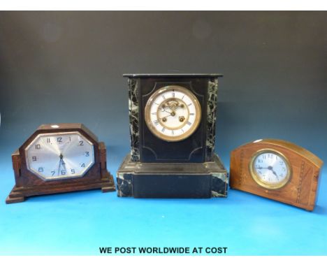 A French slate mantel clock with visible escapement together with an Art Deco mantel clock and one other 