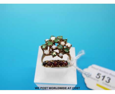 Two gold rings one set with garnets, one set with emeralds and opals in a cluster, size P and Q/R (5.2g)  