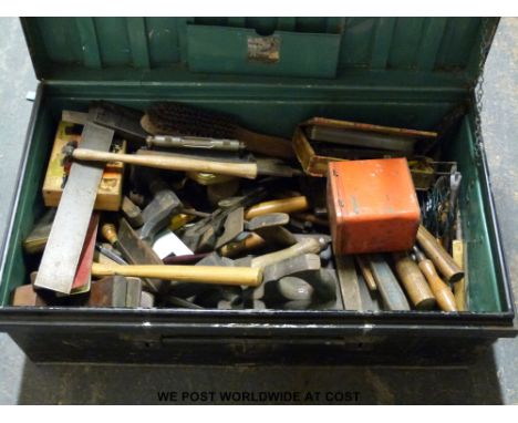 A quantity of vintage woodworking and other tools to include planes, level, hammers, micrometer, hand brace etc 