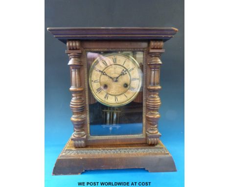 Junghans mantel clock, Pleasance & Harper Bristol to dial, in carved oak case with Roman numerals and faux mercury balanced p