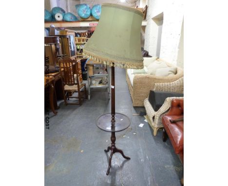 A standard lamp with tripod table base (H160cm) and a 19th century chair