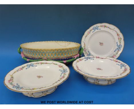 A Wedgwood Majolica style centrepiece together with a pair of Royal Worcester tazza 