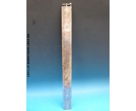 An 18" Dunhill novelty lighter formed as a ruler, marked Matthew Wylie & Co. Ltd, Glasgow and London 