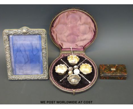 A cased set of four Victorian hallmarked salts, Birmingham 1892 together with a hallmarked silver photoframe to suit 6 x 4" p