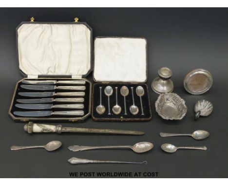 A boxed set of hallmarked silver coffee spoons, a boxed set of fruit knives with Art Deco design hallmarked silver handles pl