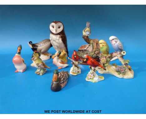 A collection of Royal Adderley bird figures including double budgerigars Beswick owl decanter, small Beswick ducks, Goebel du