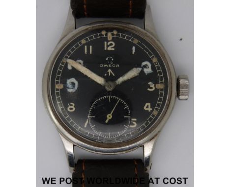 Omega British military gentleman's wristwatch, the black face with subsidiary seconds dial, Arabic numerals and ministry broa