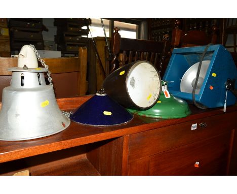 THREE VARIOUS ENAMEL SHADES, galvanised shade and an industrial light and a vintage bag of golf clubs (6)