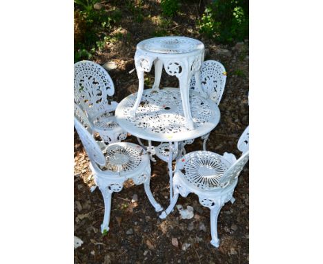 A WHITE PAINTED ALUMINIUM CIRCULAR GARDEN TABLE (diameter 69cm) with four matching chairs and a coffee table (6)