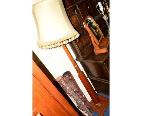 AN ART DECO OAK STANDARD LAMP, with a shade