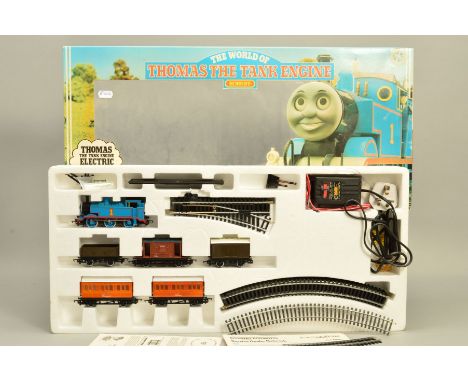 A BOXED HORNBY RAILWAYS OO GAUGE THOMAS THE TANK ENGINE ELECTRIC TRAIN SET, No.R181, comprising Thomas, Annie and Clarabel, t
