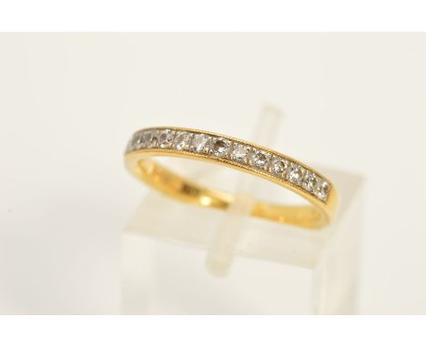 AN 18CT GOLD DIAMOND HALF ETERNITY RING, set with fifteen brilliant cut diamonds, estimated total diamond weight 0.30ct, with