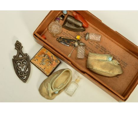 A BOX OF MAINLY MINIATURE DOLLS HOUSE ITEMS, to include a pair of suede dolls shoes, miniature iron, cut glass bottles, penkn