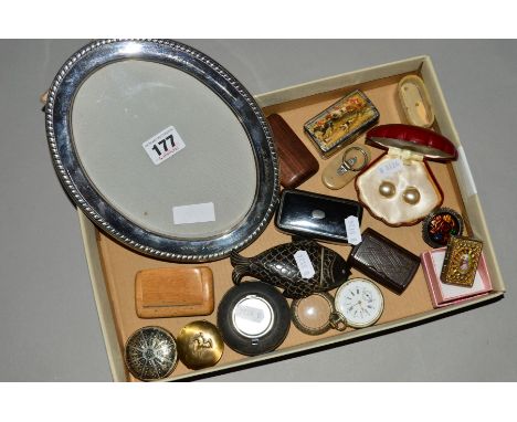 A SELECTION OF ITEMS, to include an oval silver plated picture frame, a horn trinket box, a carved fish shape, small horn wit