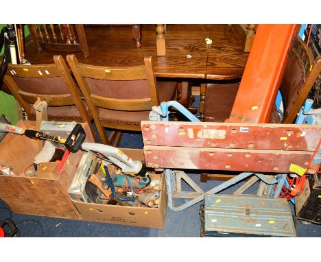 TWO BOXES OF VARIOUS HAND TOOLS including drills, saws etc, together with a Flymo garden vac, workmate and metal tool box (5)
