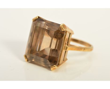 A MID 20TH CENTURY LARGE SINGLE STONE SMOKY QUARTZ RING, smoky quartz measuring 19.0mm x 16.8mm, ring size O, unmarked, teste