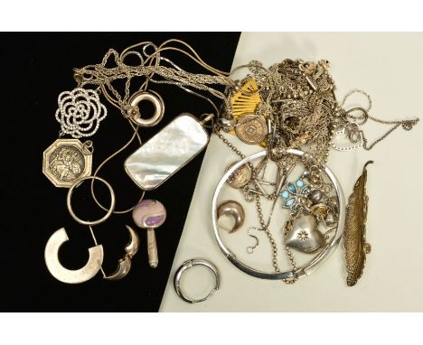 A SELECTION OF SILVER AND WHITE METAL JEWELLERY, to include a cubic zirconia bangle, a St. Christopher pendant, a filigree le