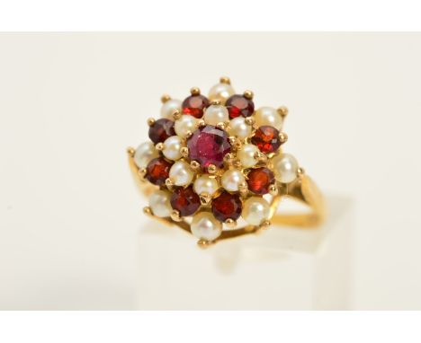 A LATE 20TH CENTURY 9CT GOLD GARNET AND SEED PEARL CLUSTER RING, ring size O, approximate gross weight 4.2 grams