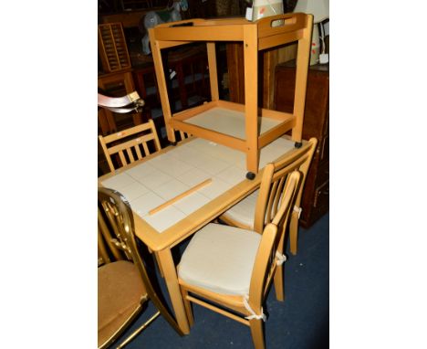 A MODERN BEECH AND TILE TOPPED KITCHEN TABLE, four matching chairs and a tea trolley (6)