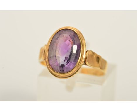 A LATE 20TH CENTURY AMETHYST SINGLE STONE RING, amethyst measuring approximately 12mm x 9mm, ring size O, stamped '585', appr