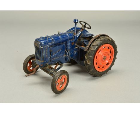 AN UNBOXED CHAD VALLEY CLOCKWORK FORDSON MAJOR E27N TRACTOR, No.9235, original version, dark blue body, orange wheels with ru