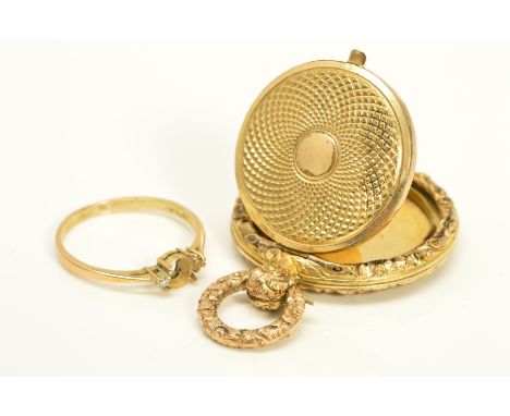 A LATE VICTORIAN GOLD PLATED PENDANT AND A RING, the circular pendant with engine turned detail to the hinged lid and reverse